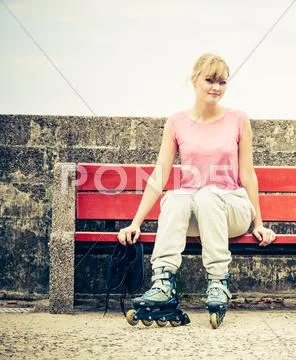 Woman With Roller Skates Outdoor.