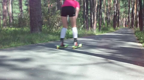 Woman on rollerskis Stockbeeldmateriaal 66217946