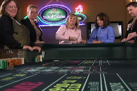 Woman Rolling Dice at Craps Table Stock Footage 10686403