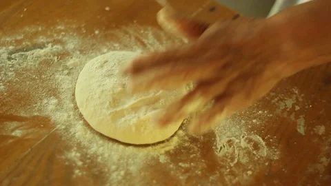 Woman rolling dough using rolling pin Stock Footage 87756567