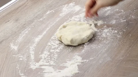 Woman rolling out dough Stock Footage