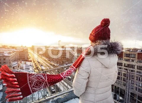 Woman on the roof in winter Petersburg Stock Photos
