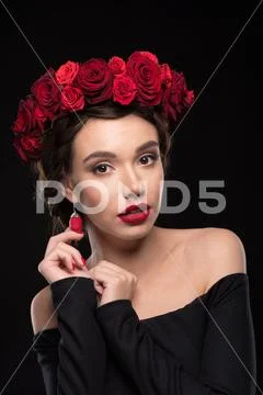 Woman with roses wreath on head Stock Photos