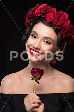 Woman with roses wreath on head Stock Photos