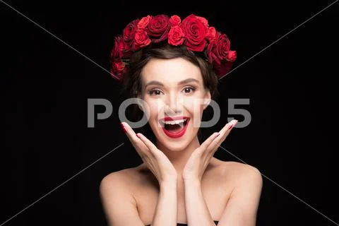 Woman with roses wreath on head Stock Photos