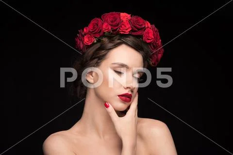 Woman with roses wreath on head Stock Photos