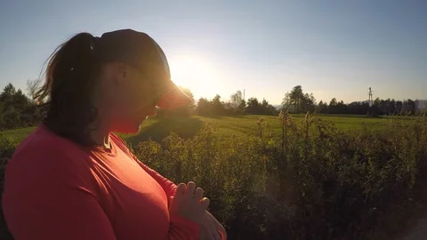 Woman runner checking smart watch before exercise Stock Footage 95501146