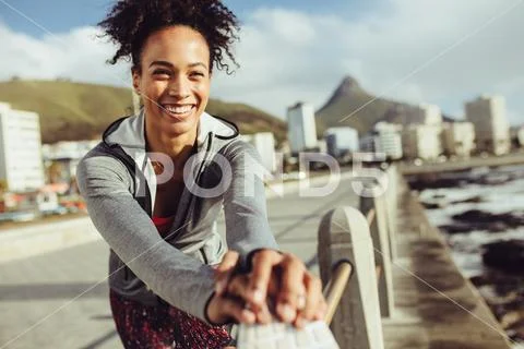 Woman runner exercising outdoors Stock Photos