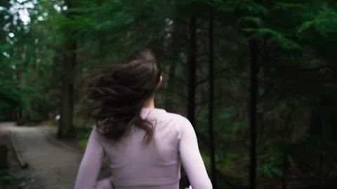Woman runner jogging on forest path. Stock Footage 95642864