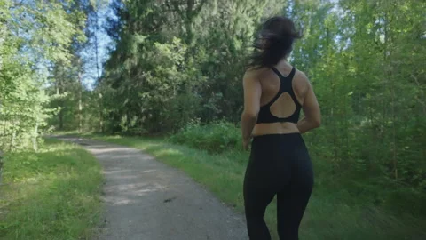 Closeup Slow Motion Shot of Woman in Leggings Running at Forest Stock Video  - Video of female, caucasian: 84859749