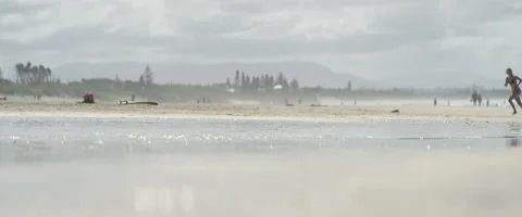 Woman running on beach Stock Footage 67020385