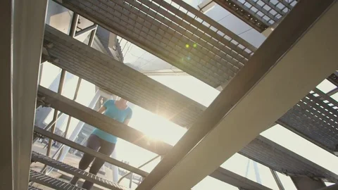 Woman Running in a City Stock Footage