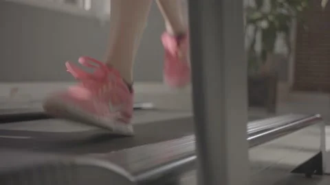 WOMAN RUNNING INDOOR Stock Footage
