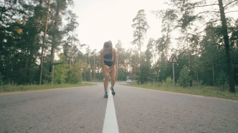 Woman running in park exercising outdoors. Healthy lifestyle Stock Footage