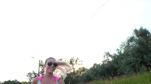 Woman Running in the Sunny Park. Stock Footage