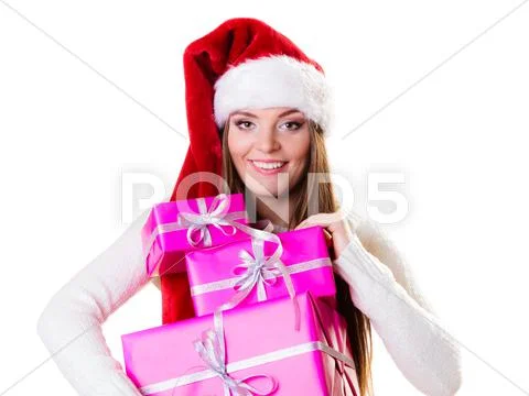 Woman santa helper hat with many pink gift boxes Stock Photos