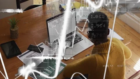 Woman scanning docs, checking laptop, charts, data overlay mapping charts for Stock Footage 328396207