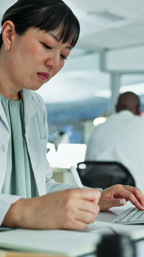 Woman, scientist and computer with notebook at lab for research, medical study Stock Footage 333166388