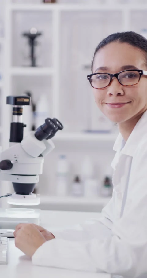 Woman, scientist and face with computer at lab for medical research, feedback Stock Footage 329764500