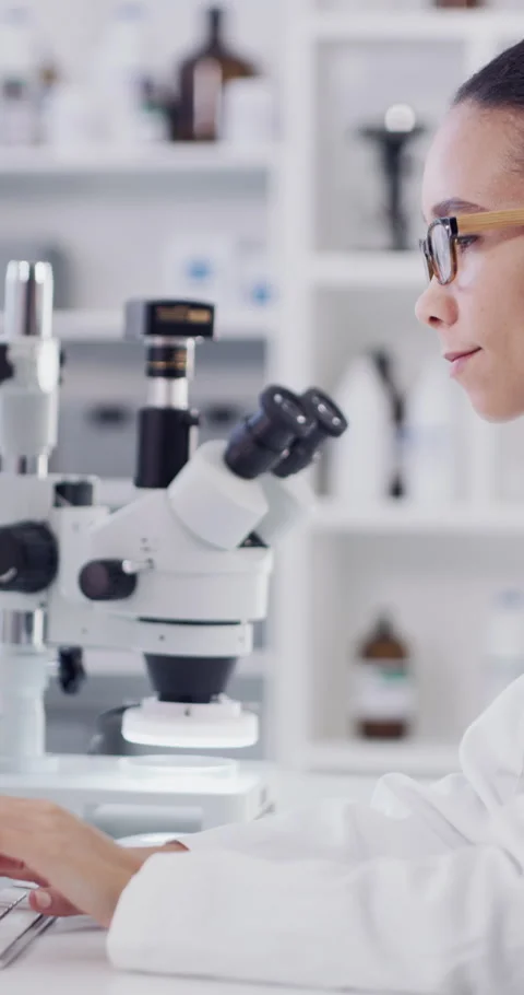 Woman, scientist and typing with computer at lab for medical research, feedback Stock Footage 329744582