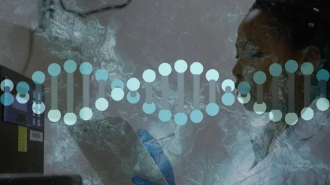 Woman scientist checking instrument data, animated DNA helix fading in and Stock Footage 330741078