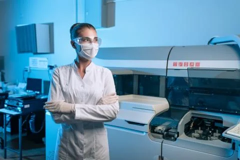 Woman scientist chemist working in modern laboratory Stock Photos