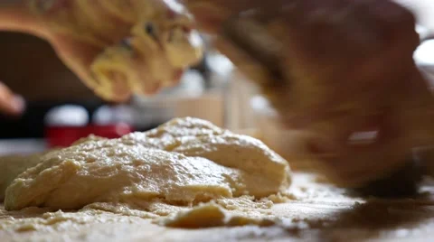 Woman scraping dough from table Stock Footage 49807160