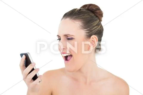 Woman screaming on the phone Stock Photos