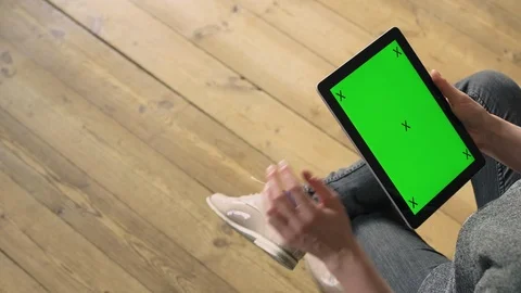 Woman scrolling through a tablet. Stock Footage 127062830