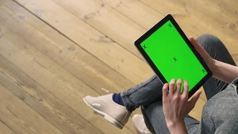 Woman scrolling through a tablet. Stock Footage 127063540