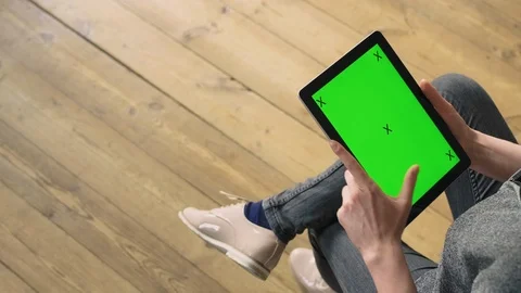 Woman scrolling through a tablet. Stock Footage 127064277