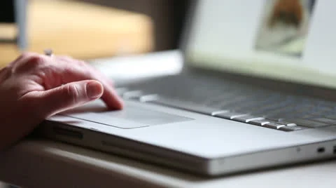Woman Scrolls a Website Using Her Laptop Trackpad 스톡 동영상 24821342