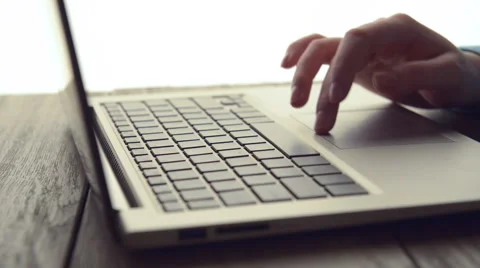 Woman Scrolls a Website Using Her Laptop Stock Footage 48286790