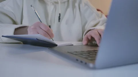 Woman Scrolls a Website Using Her Laptop Track Pad Stock Footage 101260694