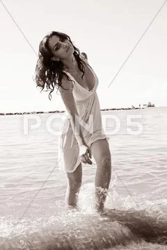 Woman in sea Stock Photos