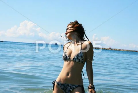 Woman in sea Stock Photos