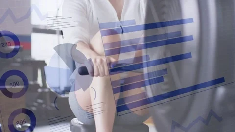 Woman securing grip then rowing on machine in gym, animated fitness charts Stock Footage 333278498