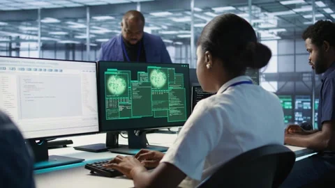 Woman seeing critical error on PC screen in data center Stock Footage 319531490