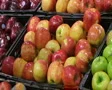 Woman Selecting Apples In Produce SD Footage