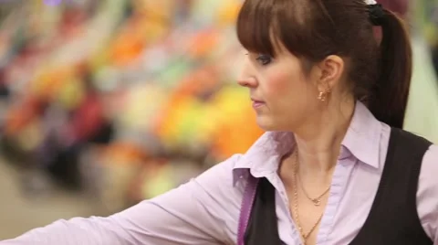 Woman selecting fruit at Farmer's Market and adds to cart Stock Footage 59335495