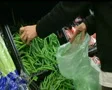 Woman Selecting Green Beans In Produce SD Footage