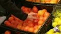 Woman Selecting Oranges In Produce HD Footage