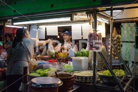 Woman sells traditional Thai food Stock Photos