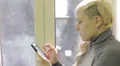 woman sends a sms HD Footage