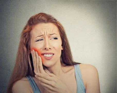 Woman with sensitive tooth ache crown problem Stock Photos