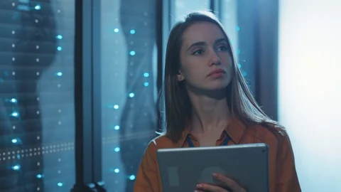 Woman server specialist using digital tablet controlling working system of rack Stock Footage 119277602