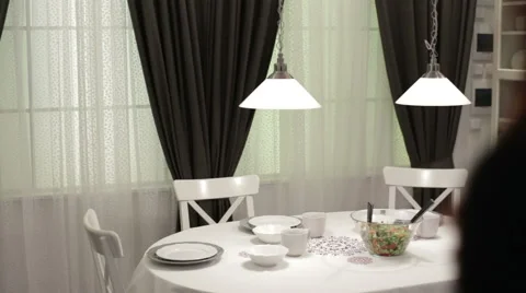 A woman serves a table Stock Footage 62796489