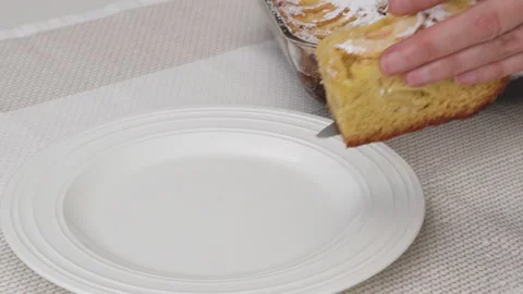 Woman serving apple cake. Slice of fresh baked apple cake Stock Footage 169477629