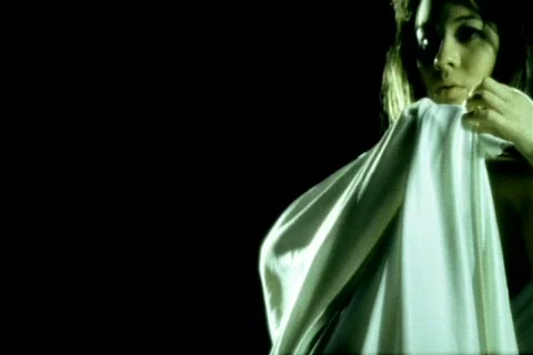 Woman in sheet dancing Stock Footage 113574