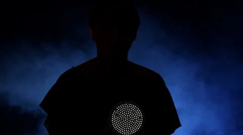 Woman shining a flashlight Stock Footage 8607469
